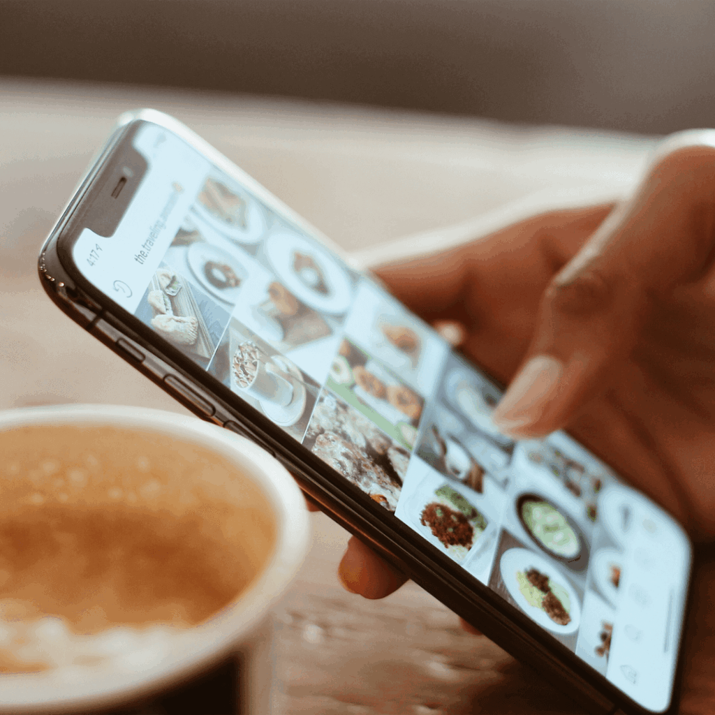 A picture of someone scrolling on their phone.